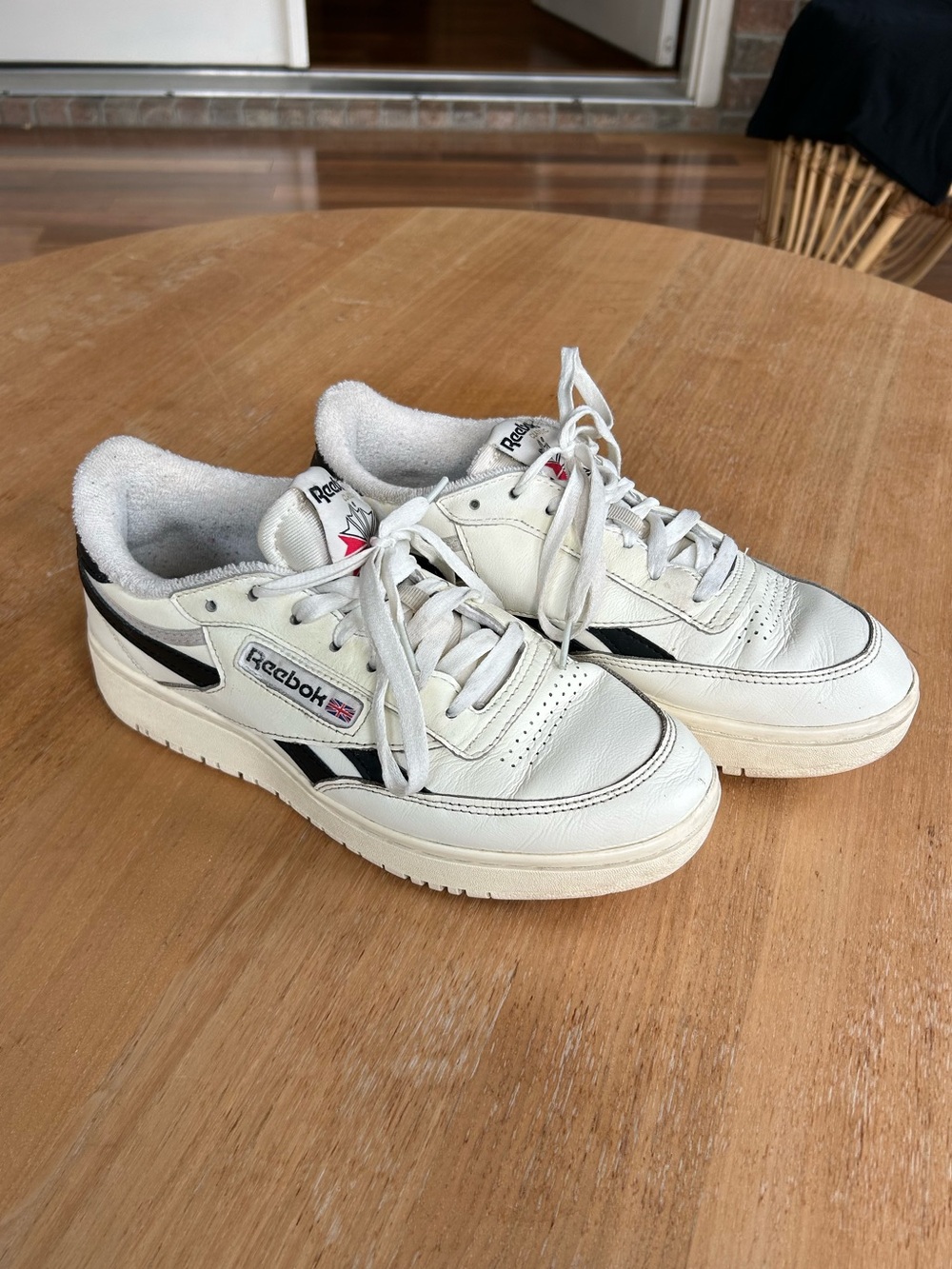 Reebok Women's White Leather Casual Sneakers with Black Accents